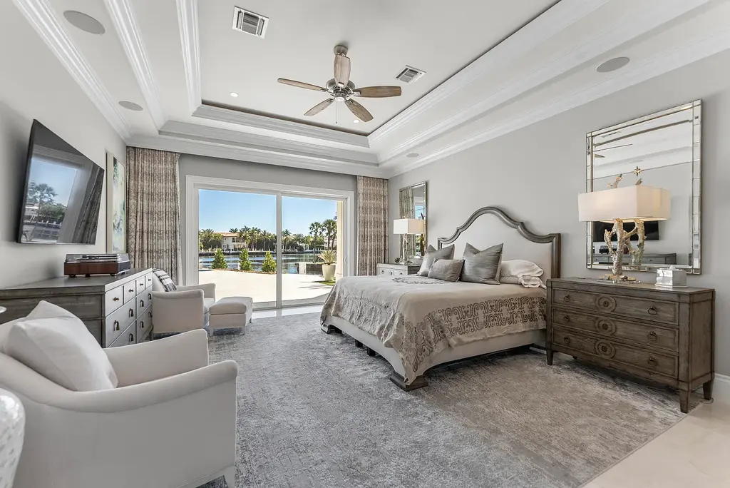 Stunning $10.5 Million British West Indies Waterfront Estate Hits the Market in Delray Beach 12 976 Cypress Drive luxury waterfront estate exterior view in Delray Beach with British West Indies architecture