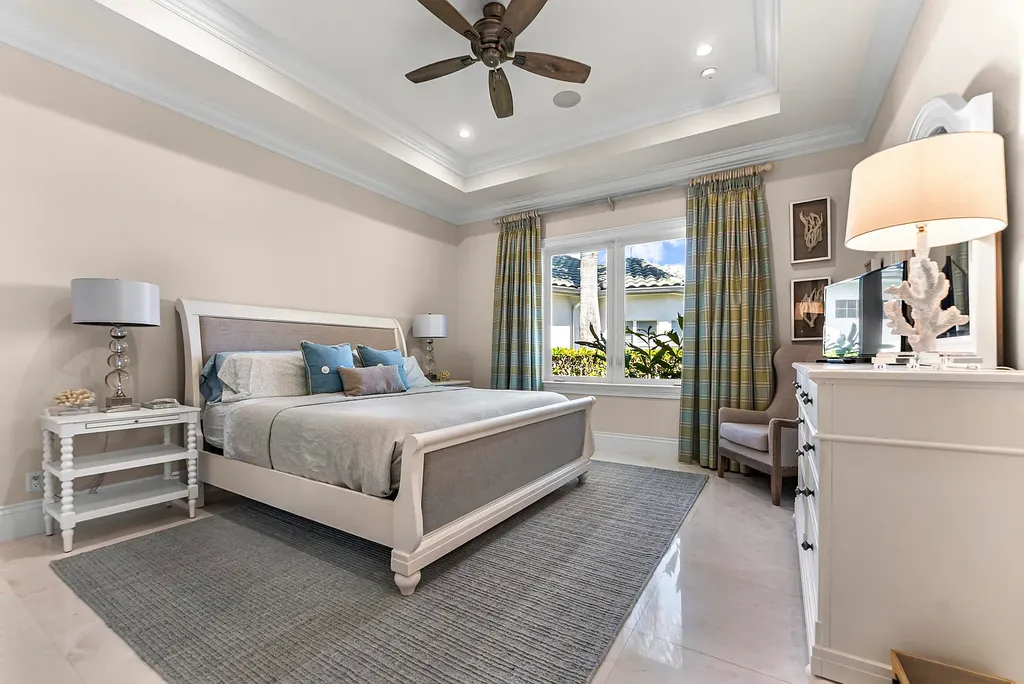 Stunning $10.5 Million British West Indies Waterfront Estate Hits the Market in Delray Beach 14 976 Cypress Drive luxury waterfront estate exterior view in Delray Beach with British West Indies architecture