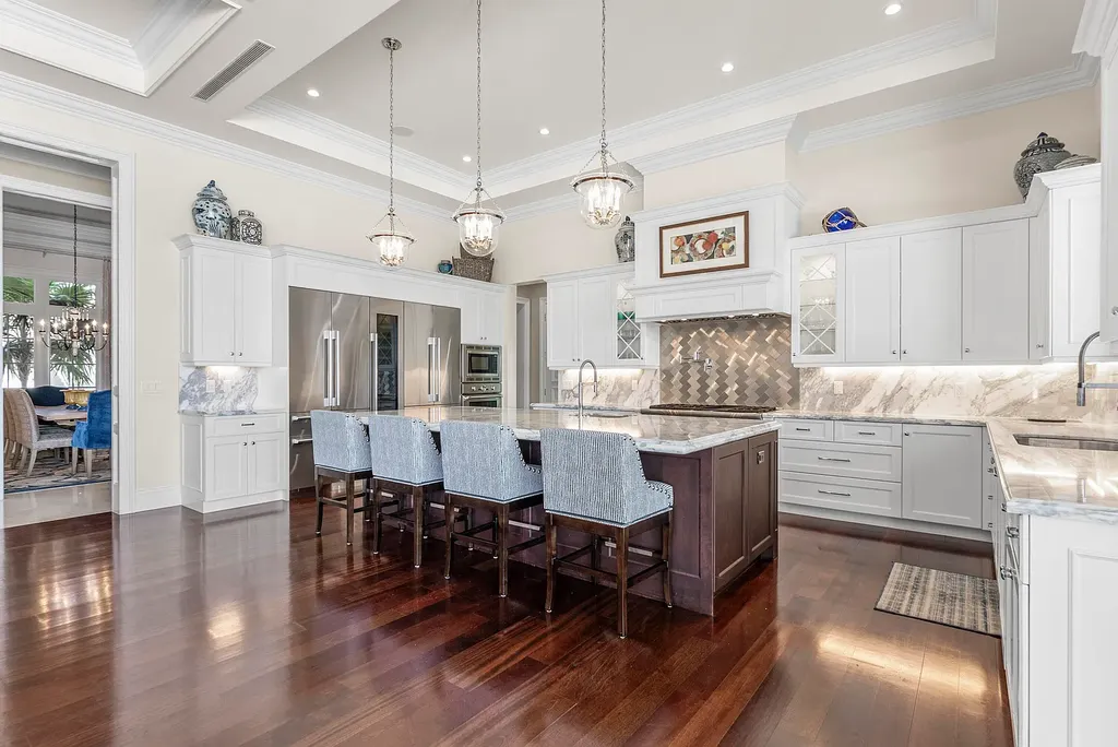 Stunning $10.5 Million British West Indies Waterfront Estate Hits the Market in Delray Beach 8 976 Cypress Drive luxury waterfront estate exterior view in Delray Beach with British West Indies architecture