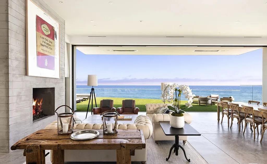 Most Expensive Homes in Malibu: 10 Trophy Listings Redefining Pricing Power 23 Malibu beachfront living room with open glass walls and direct ocean views
