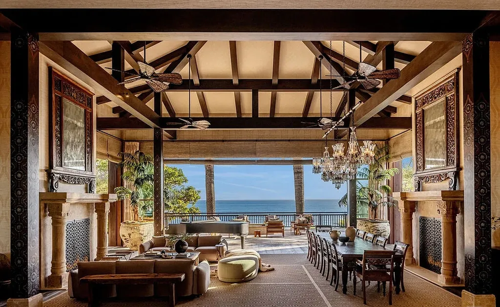 Most Expensive Homes in Malibu: 10 Trophy Listings Redefining Pricing Power 17 Malibu luxury interior with wood beams, chandelier, and ocean view terrace