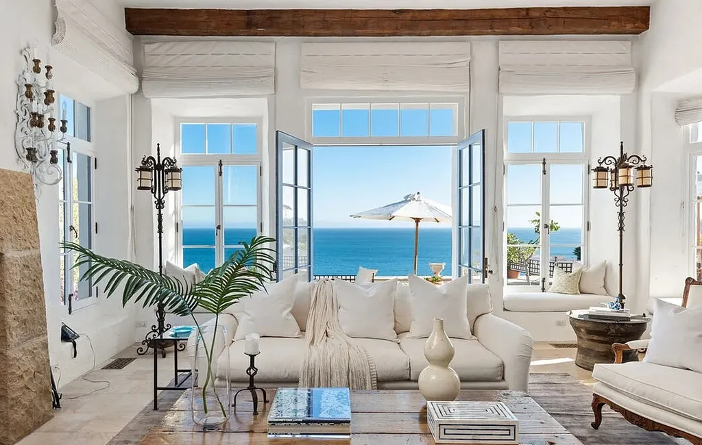Most Expensive Homes in Malibu: 10 Trophy Listings Redefining Pricing Power 3 Malibu luxury home living room with ocean view and open glass doors