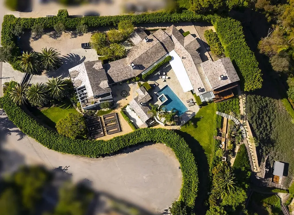 Most Expensive Homes in Malibu: 10 Trophy Listings Redefining Pricing Power 12 aerial view of Malibu estate compound with pool, guest houses, and landscaped grounds