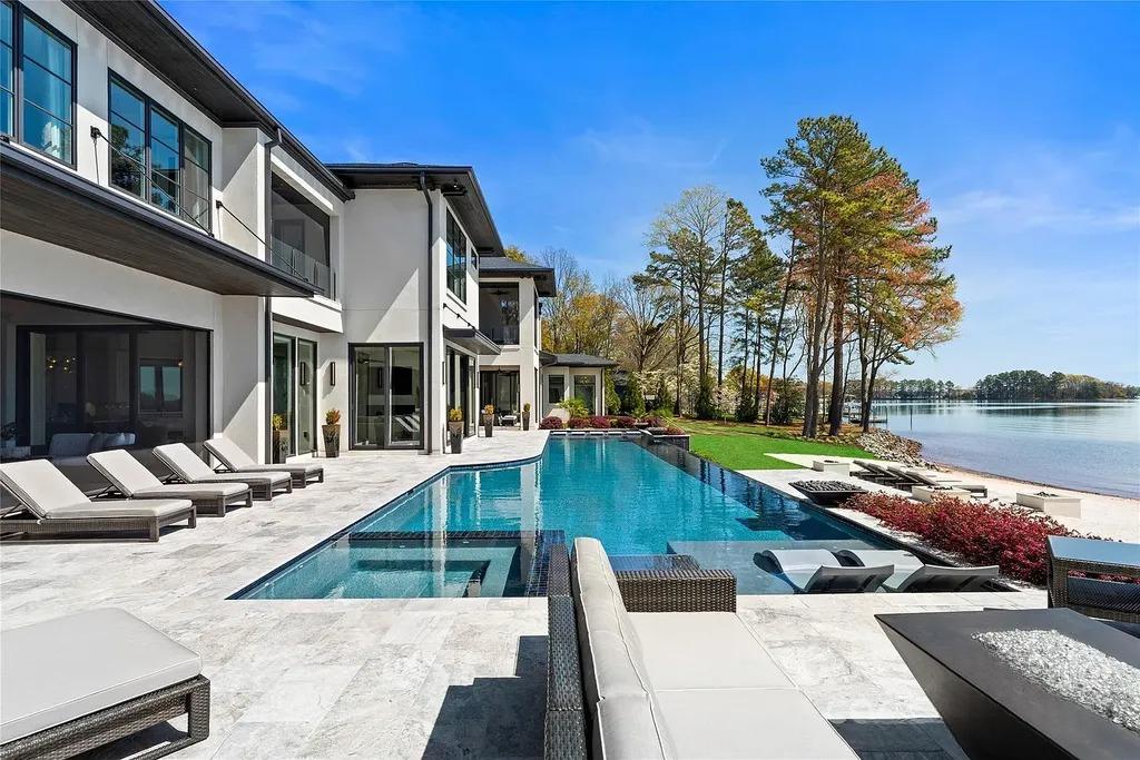 Lake Norman Estate Blends Architectural Precision With Private Waterfront Living 10 Luxury waterfront home with infinity pool overlooking Lake Norman in Cornelius North Carolina
