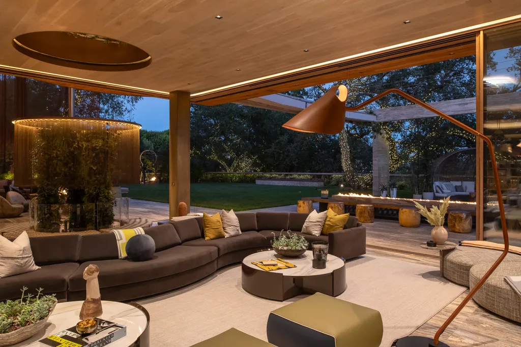 Most Expensive Homes in Los Angeles 22 luxury indoor outdoor living space in bel air mansion with modern design and ambient lighting