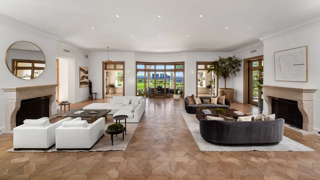 Most Expensive Homes in Los Angeles 9 large luxury living room inside beverly hills estate with open layout and city view