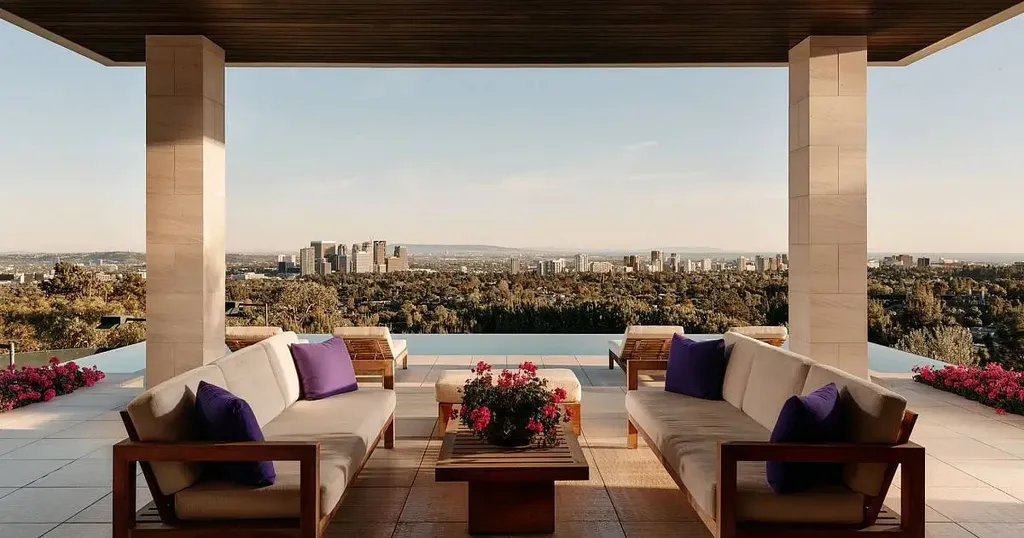 Most Expensive Homes in Los Angeles 6 modern beverly hills mansion terrace with panoramic city view and outdoor seating los angeles