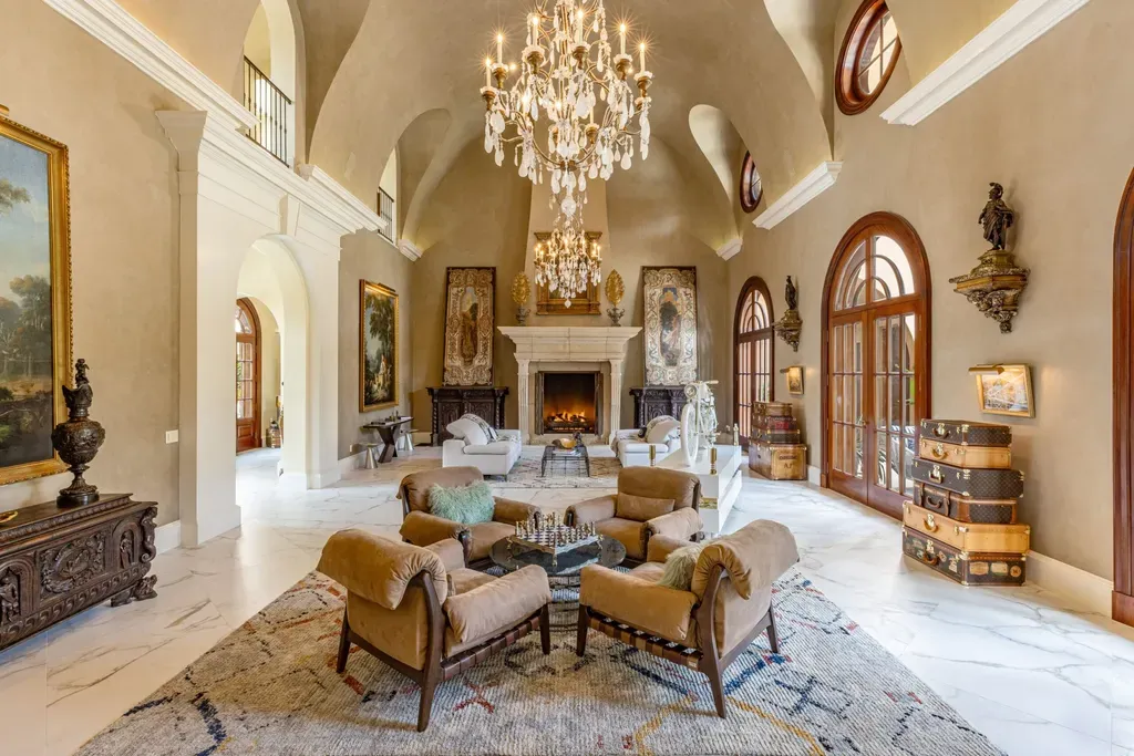 Most Expensive Homes in Los Angeles 2 luxury living room in beverly park mansion with high ceilings chandelier and fireplace los angeles