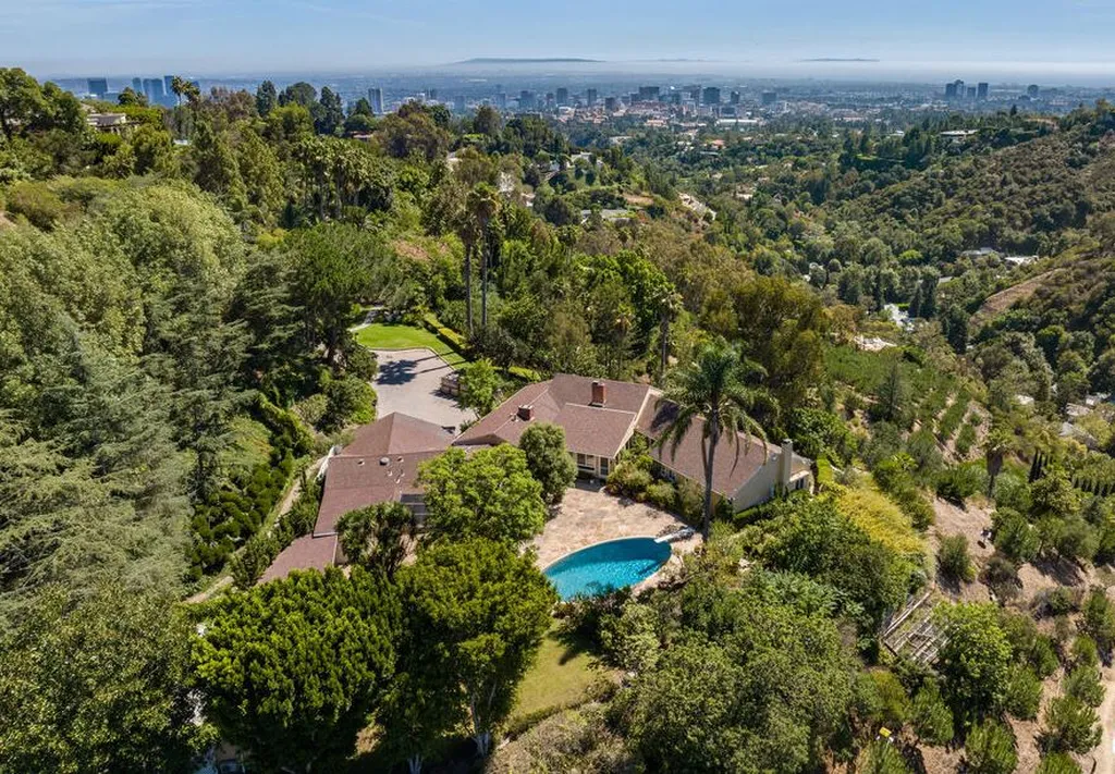 Most Expensive Homes in California 15 aerial view of Crown Bel Air estate with main residence and pool surrounded by lush landscape