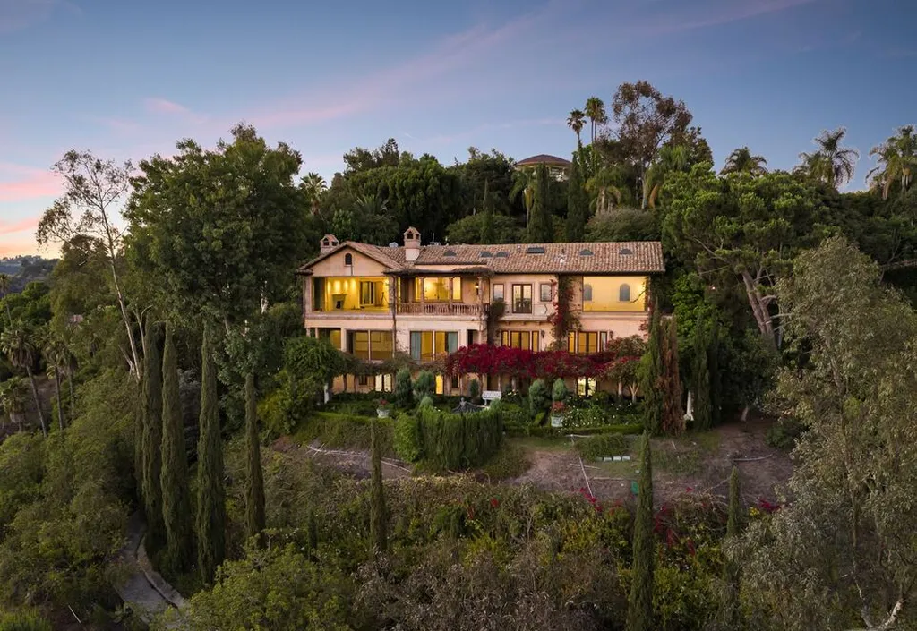 Most Expensive Homes in California 17 private pool overlooking Los Angeles city view surrounded by dense greenery