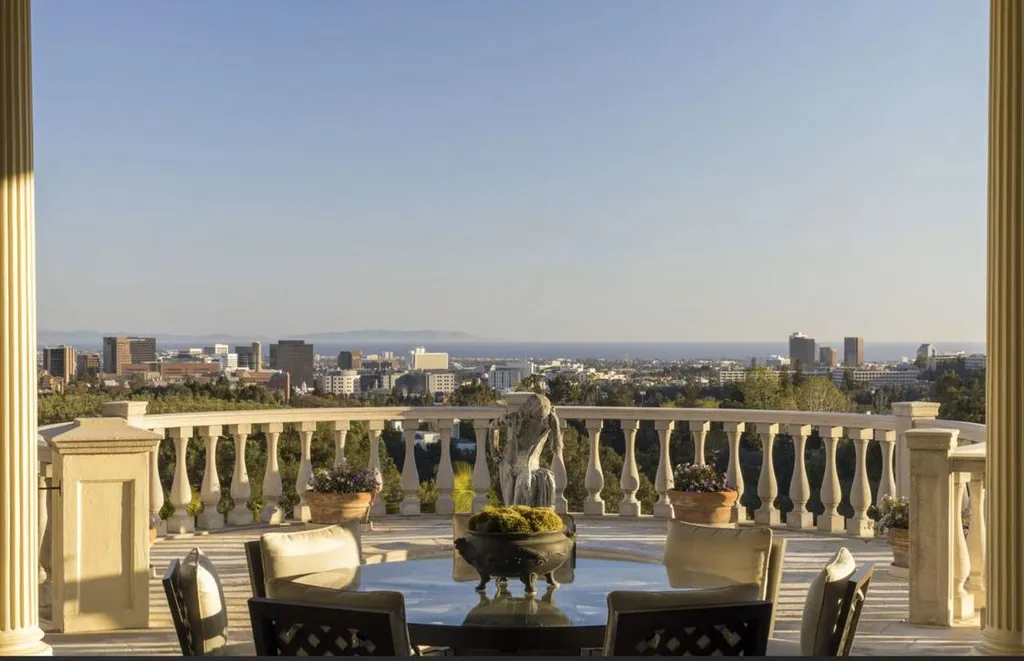 Most Expensive Homes in California 24 outdoor terrace with classical balustrade overlooking Los Angeles skyline