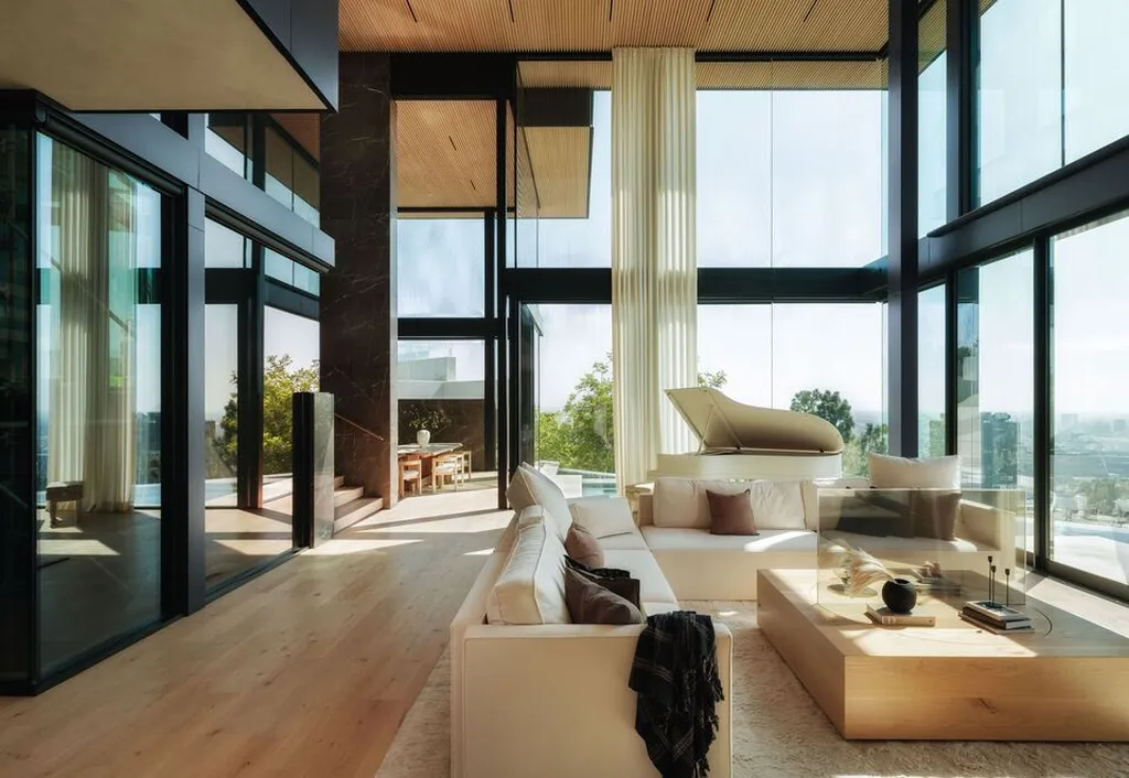 Most Expensive Homes in California 38 modern glass living room with double height ceiling and panoramic city views
