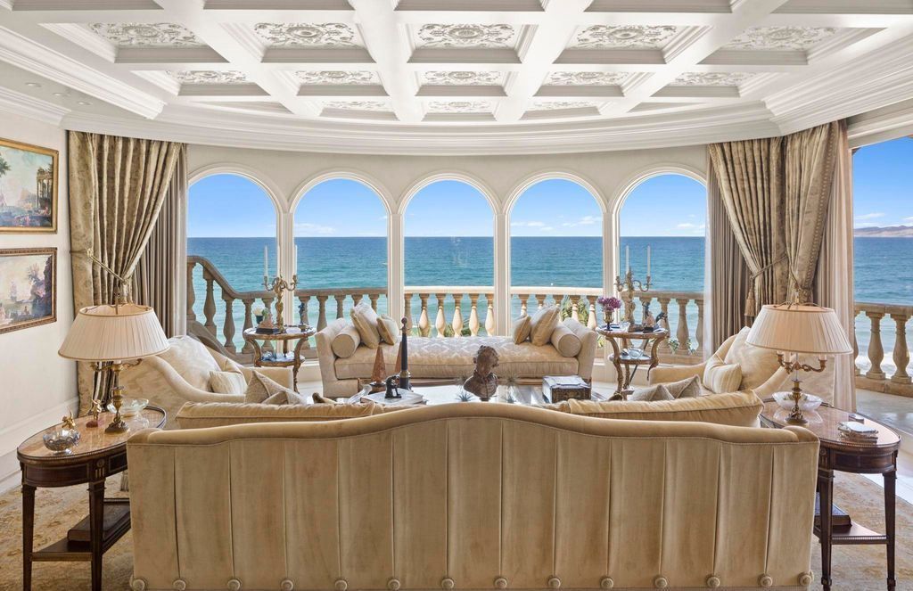 Most Expensive Homes in California 27 classic luxury living room with arched windows overlooking ocean