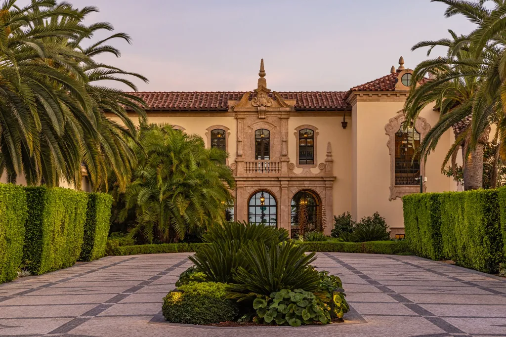 A Bel Air Estate That Redefines the Upper Limits of Global Luxury 3 front courtyard and entrance of Chalon Road estate in Bel Air featuring classic architecture and landscaped motor court