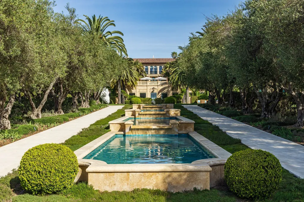 A Bel Air Estate That Redefines the Upper Limits of Global Luxury 10 water feature and landscaped garden axis at Chalon Road estate in Bel Air with olive trees and terraced design