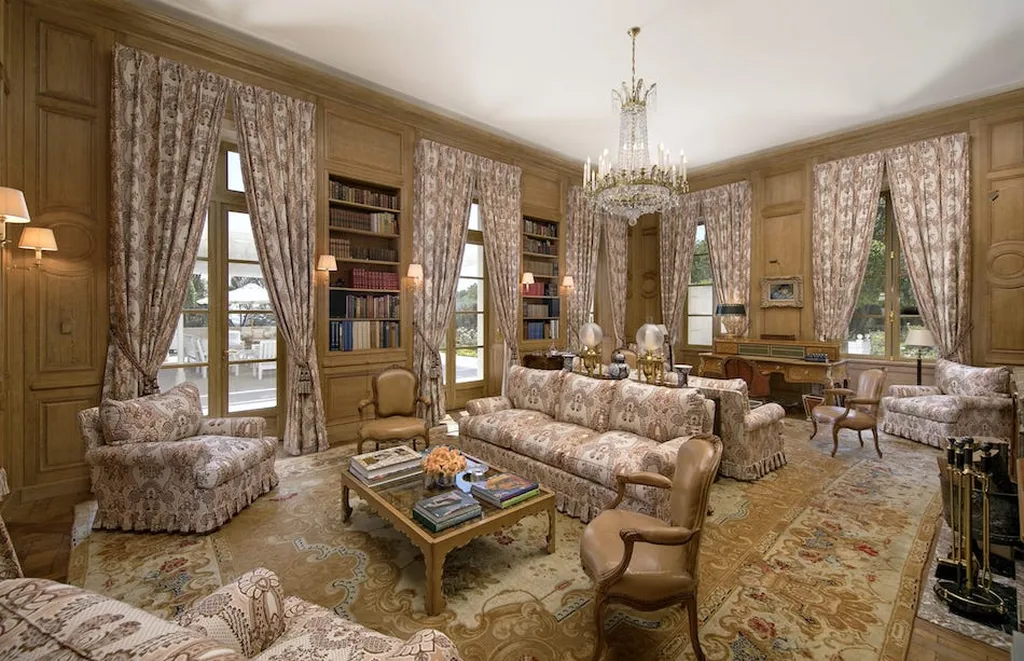 Chartwell Estate: One of the Most Iconic Estates in Bel Air Los Angeles 6 Library lounge at Chartwell Estate with wood paneling and classic furnishings in Bel Air Los Angeles