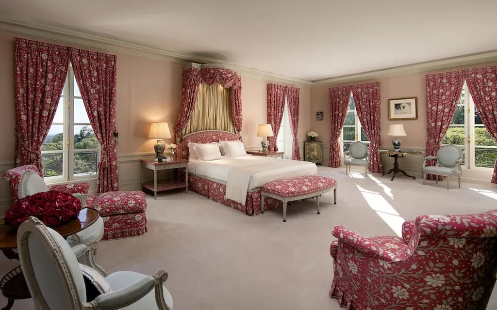 Chartwell Estate: One of the Most Iconic Estates in Bel Air Los Angeles 9 Primary bedroom suite at Chartwell Estate with classic decor and garden views in Bel Air Los Angeles