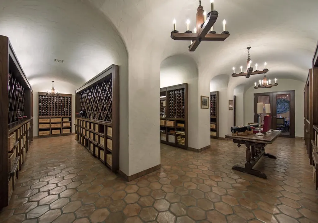 Chartwell Estate: One of the Most Iconic Estates in Bel Air Los Angeles 12 Wine cellar at Chartwell Estate with arched ceilings and custom storage in Bel Air Los Angeles
