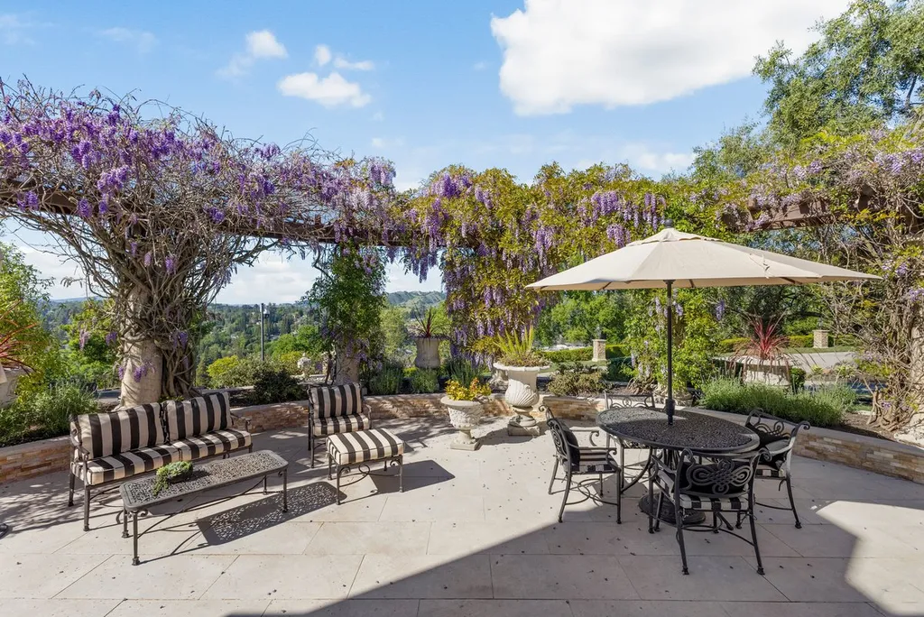 A Hilltop Estate in Danville That Defines a Different Kind of Luxury 16 outdoor terrace with pergola and garden seating at luxury estate in Danville California overlooking valley
