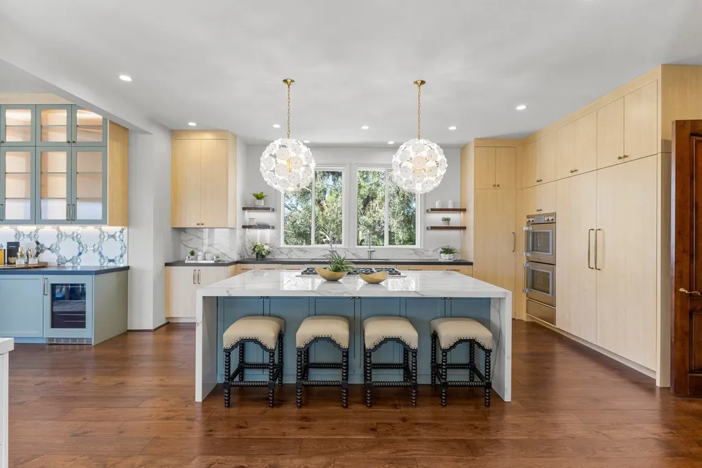 A Hilltop Estate in Danville That Defines a Different Kind of Luxury 6 gourmet kitchen in Danville luxury estate with large island custom cabinetry and designer lighting