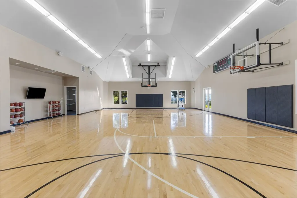 A Hilltop Estate in Danville That Defines a Different Kind of Luxury 9 indoor basketball court inside luxury estate in Danville California with full size hardwood court and high ceilings