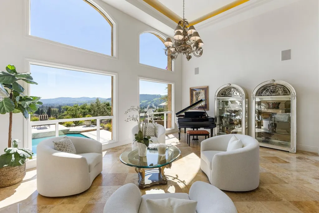 A Hilltop Estate in Danville That Defines a Different Kind of Luxury 5 luxury living room in Danville estate with large windows overlooking valley and pool views