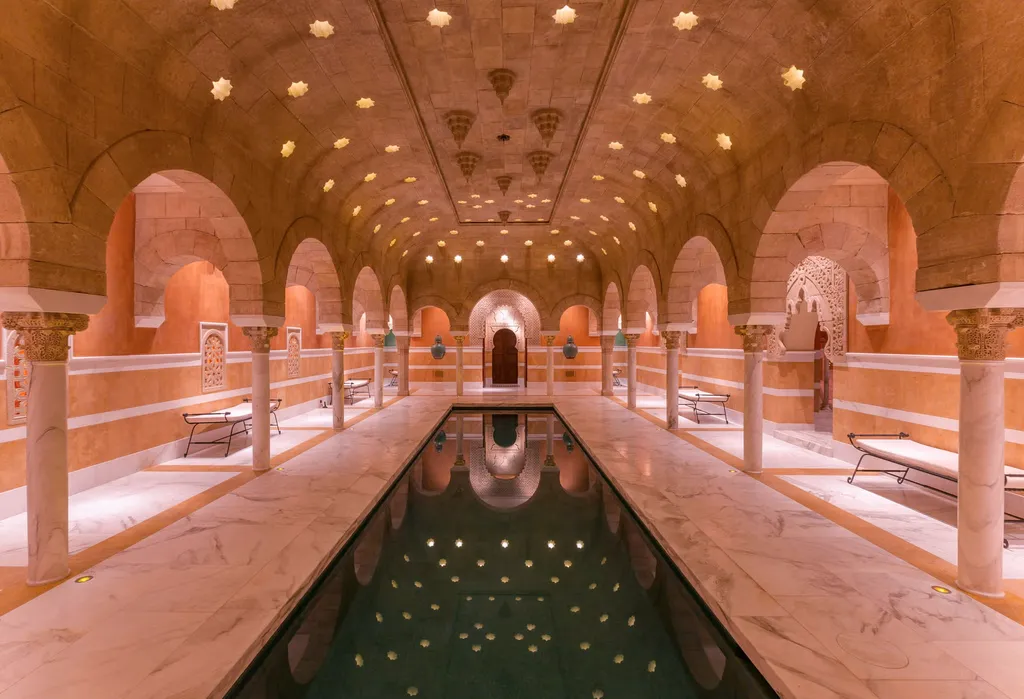 Hacienda de la Paz: One of the Largest Private Estates in California 11 Hacienda de la Paz indoor hammam pool with arched ceilings marble floors and symmetrical spa design
