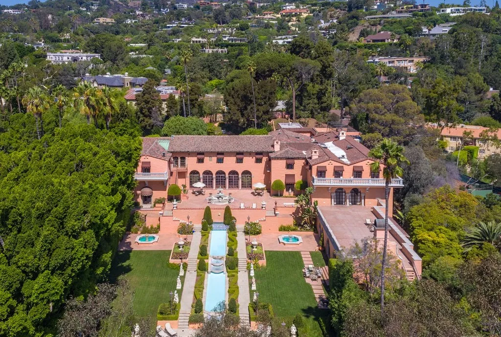 The Hearst Estate in Beverly Hills: A Historic Landmark Where Hollywood Legacy Meets Market Reality 1 The Hearst Estate in Beverly Hills with grand entrance long private driveway and historic mansion architecture