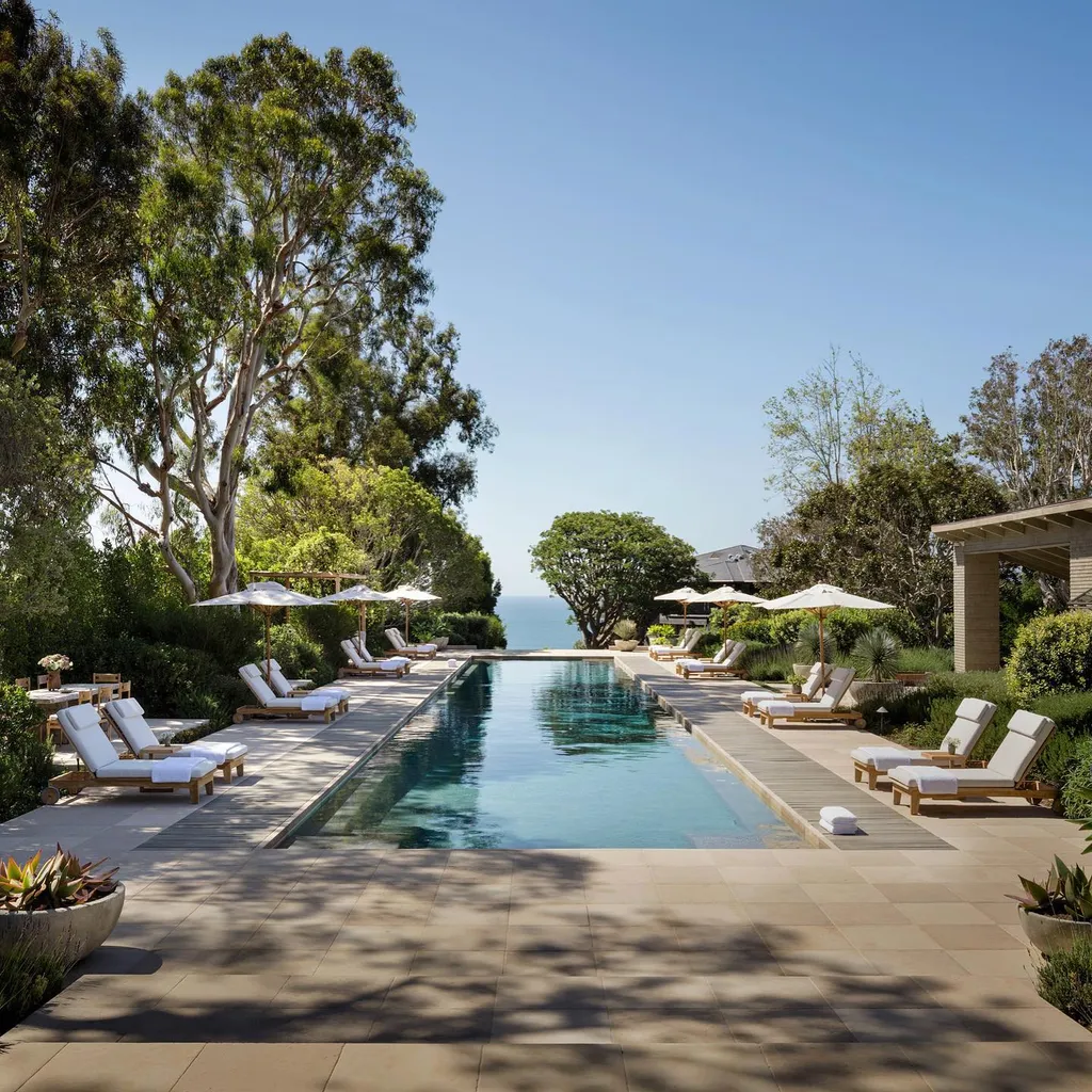 Most Expensive Homes Ever Sold in California 11 Luxury outdoor pool area with lounge chairs and ocean view in Malibu estate