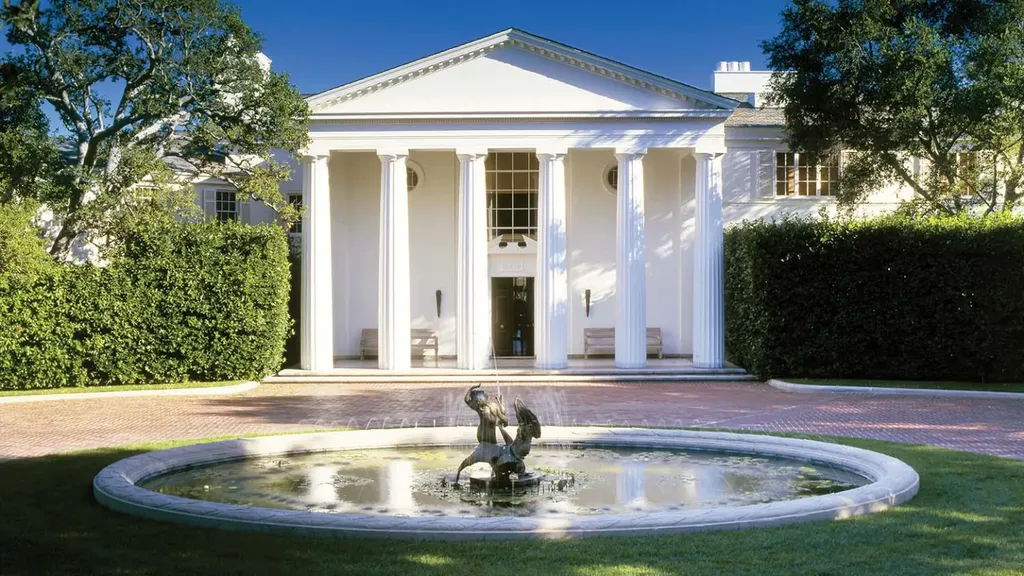 Most Expensive Homes Ever Sold in California 13 Classical front facade of Warner Estate with columns and symmetrical architecture in Beverly Hills