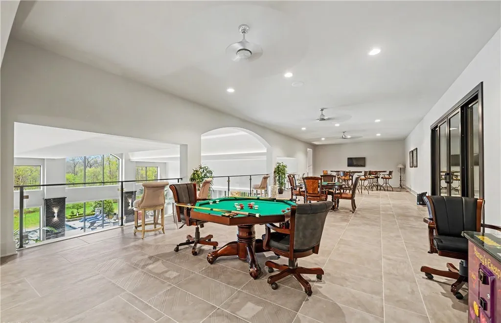 An Award Winning Modern Wellness Estate in Ohio Lists for $10,900,000 as a Private Resort Inspired Sanctuary 7 Luxury game lounge and entertainment loft at 1433 Ridgemont Trl in Hinckley Ohio