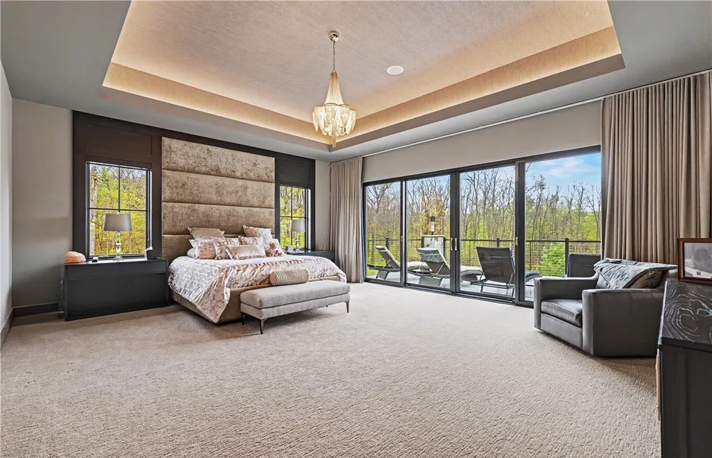 An Award Winning Modern Wellness Estate in Ohio Lists for $10,900,000 as a Private Resort Inspired Sanctuary 4 Luxury primary bedroom suite with private terrace at 1433 Ridgemont Trl in Hinckley Ohio