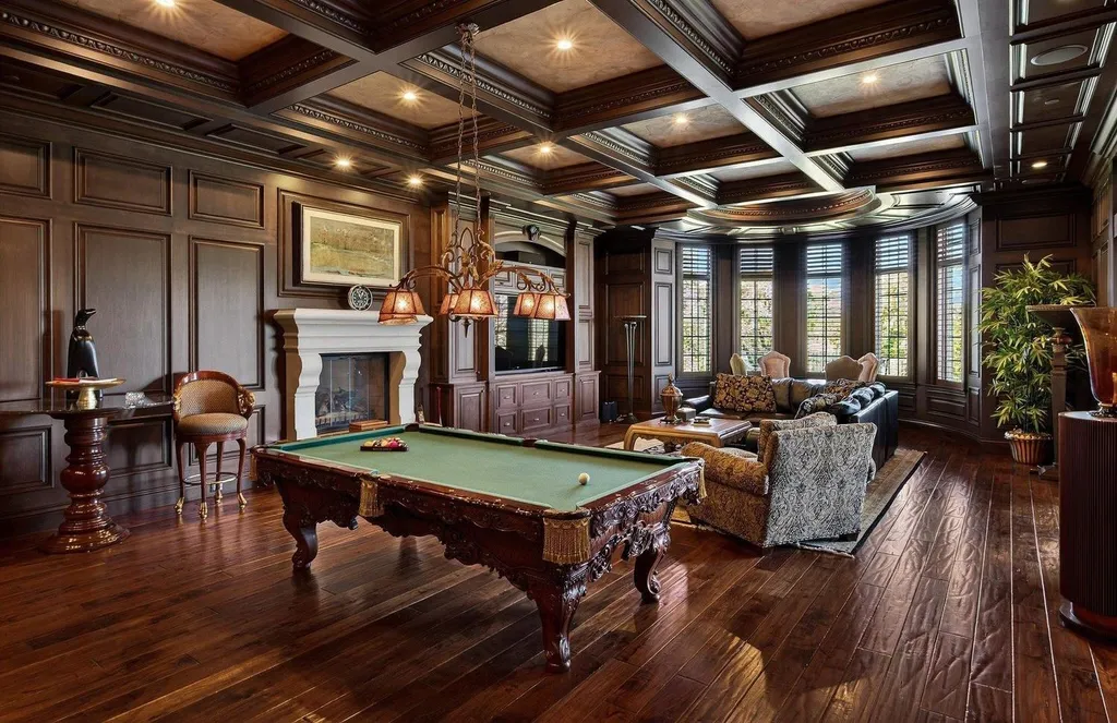 Inside a $13.5 Million Mediterranean Mansion in Ruby Hill, Pleasanton 9 Luxury billiards room at 1515 Germano Way featuring coffered wood ceilings, fireplace, lounge seating, and custom pool table.