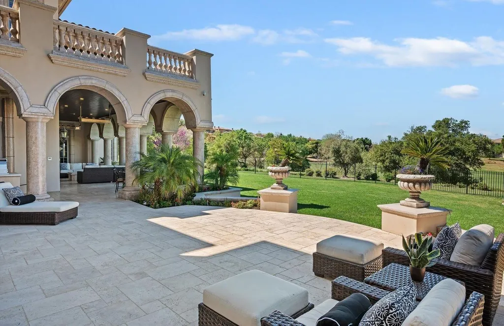 Inside a $13.5 Million Mediterranean Mansion in Ruby Hill, Pleasanton 13 Covered outdoor loggia at 1515 Germano Way featuring Mediterranean arches, stone columns, luxury lounge seating, and golf course views.