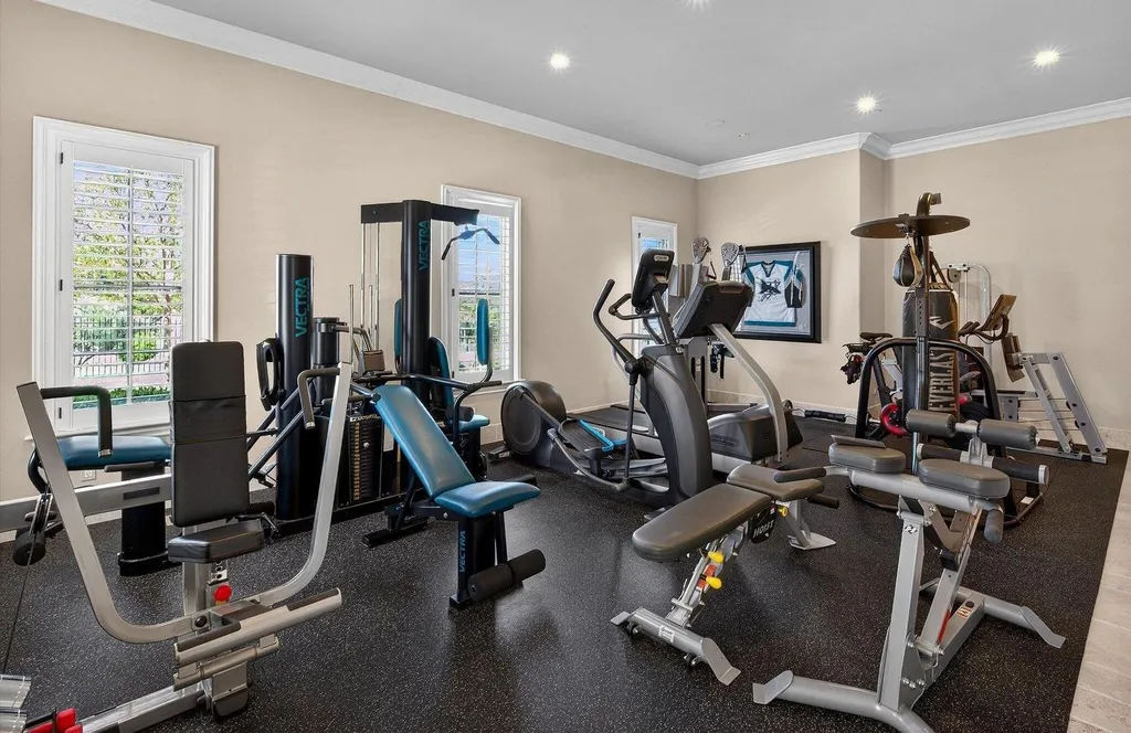 Inside a $13.5 Million Mediterranean Mansion in Ruby Hill, Pleasanton 10 Private fitness room inside 1515 Germano Way equipped with cardio machines, strength equipment, and luxury wellness amenities.