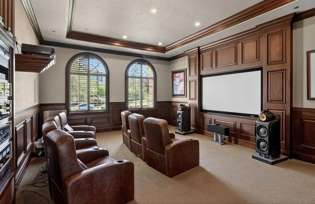 Inside a $13.5 Million Mediterranean Mansion in Ruby Hill, Pleasanton 8 Private home theater at 1515 Germano Way with leather recliners, surround sound system, and custom wood-paneled interiors.