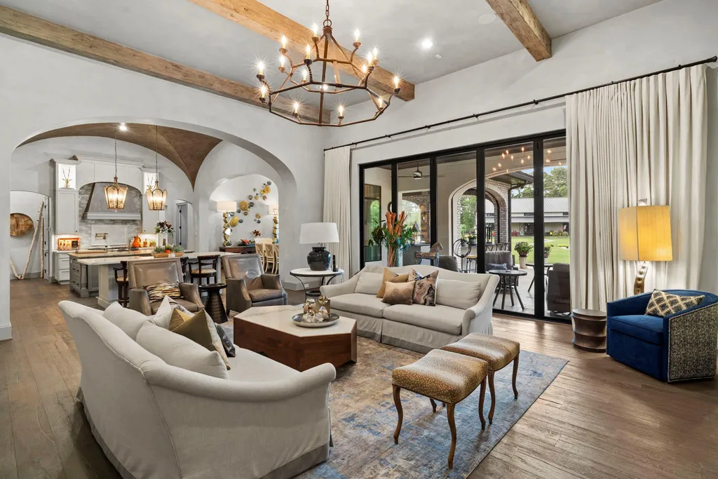 A Multigenerational Texas Estate in Tomball Lists for $6,000,000 With Resort Grounds and Private Guest Residence 2 Elegant living room with vaulted ceilings at 5 Willowcreek Ranch Dr in Tomball TX