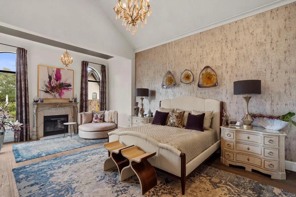 A Multigenerational Texas Estate in Tomball Lists for $6,000,000 With Resort Grounds and Private Guest Residence 5 Luxury primary bedroom with vaulted ceilings and fireplace at 5 Willowcreek Ranch Dr in Tomball TX