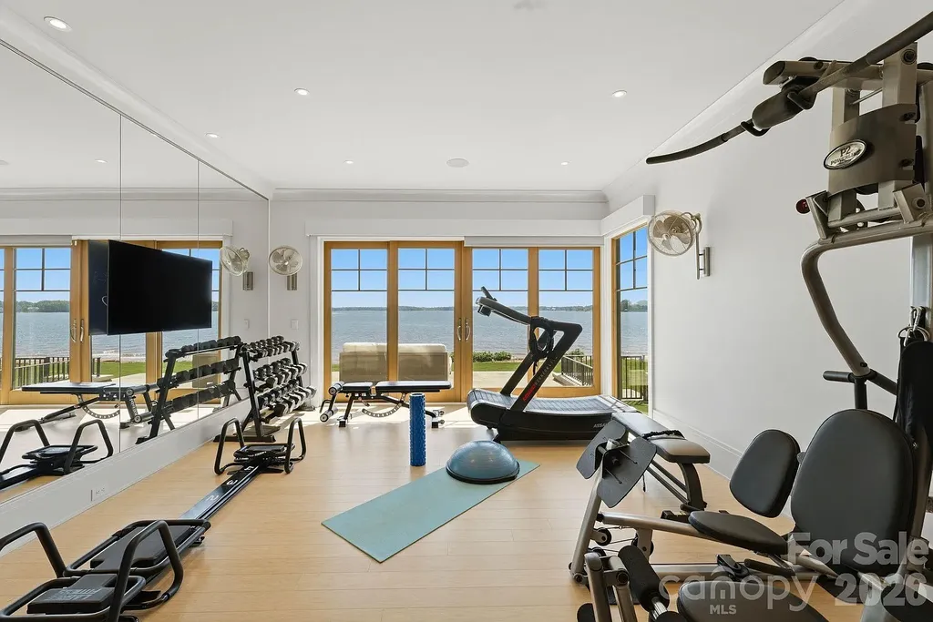 Lake Norman’s Ultimate Peninsula Estate Lists for $18,500,000 in Norman Estates 9 Private fitness studio overlooking Lake Norman at 8515 Norman Estates Dr