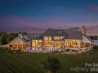 Lake Norman’s Ultimate Peninsula Estate Lists for $18,500,000 in Norman Estates 1 8515 Norman Estates Dr luxury Lake Norman waterfront estate with infinity pool in Denver NC