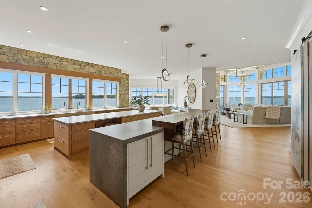 Lake Norman’s Ultimate Peninsula Estate Lists for $18,500,000 in Norman Estates 10 Chef kitchen with panoramic Lake Norman views at 8515 Norman Estates Dr