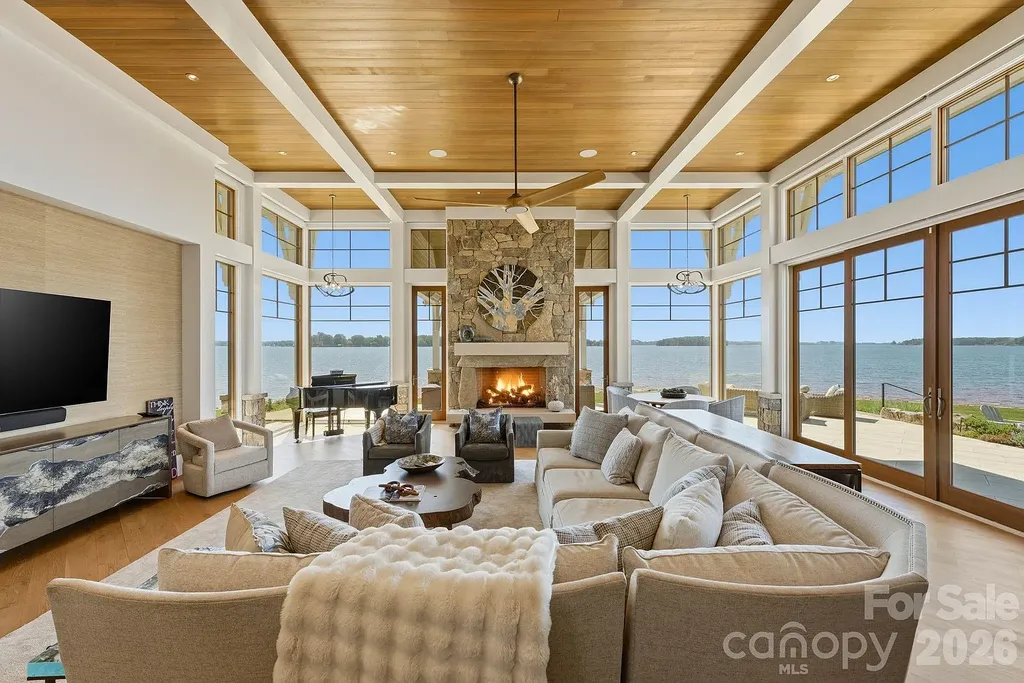 Lake Norman’s Ultimate Peninsula Estate Lists for $18,500,000 in Norman Estates 5 Lakefront great room at 8515 Norman Estates Dr with panoramic Lake Norman views