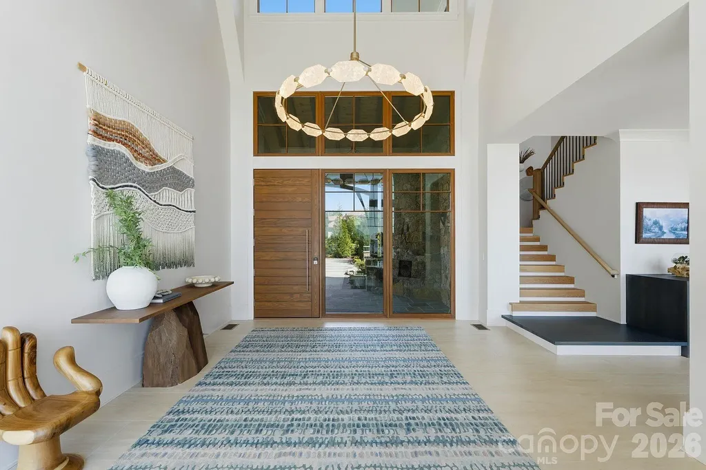 Lake Norman’s Ultimate Peninsula Estate Lists for $18,500,000 in Norman Estates 4 Modern foyer entrance at 8515 Norman Estates Dr luxury Lake Norman estate in Denver NC