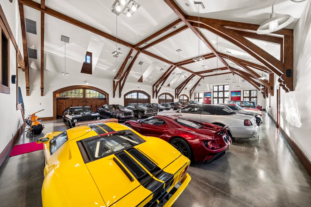 Inside Florida’s Most Ambitious Private Estate: The Oaks Emerges as a $115 Million Benchmark in Tampa Bay 10 Luxury car showroom at The Oaks Estate with space for multiple vehicles in Tampa, Florida