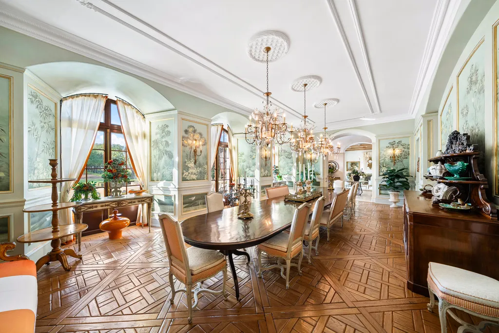 Inside Florida’s Most Ambitious Private Estate: The Oaks Emerges as a $115 Million Benchmark in Tampa Bay 4 Formal dining room at The Oaks Estate featuring chandeliers, parquet flooring, and classic European design in Tampa, Florida