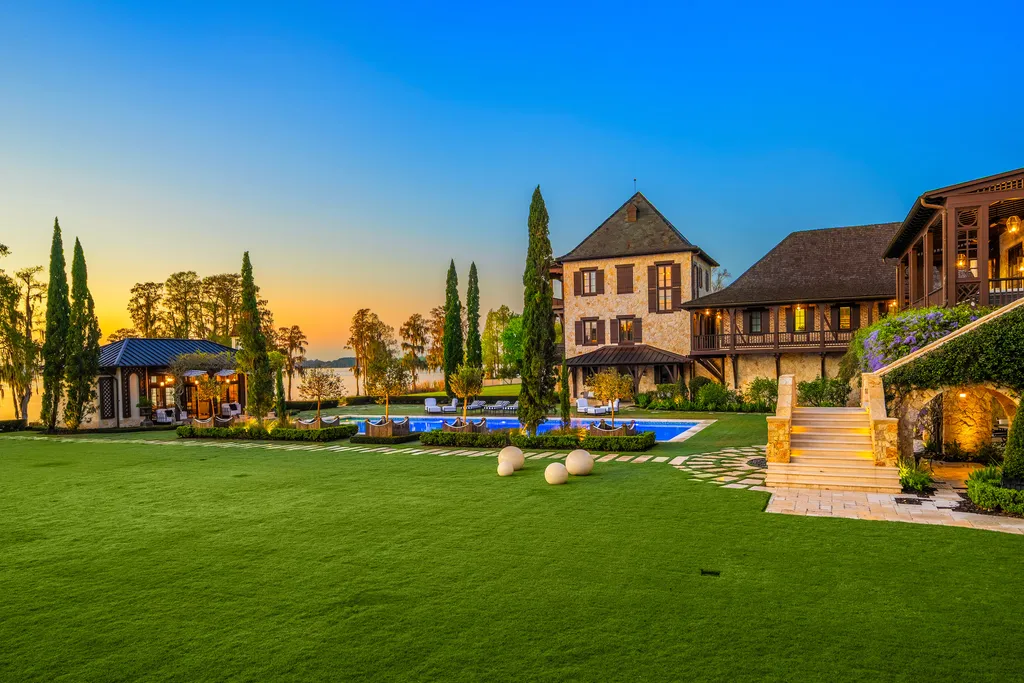 Inside Florida’s Most Ambitious Private Estate: The Oaks Emerges as a $115 Million Benchmark in Tampa Bay 13 Lakefront garden and pool area at The Oaks Estate overlooking Lake Thonotosassa in Tampa, Florida