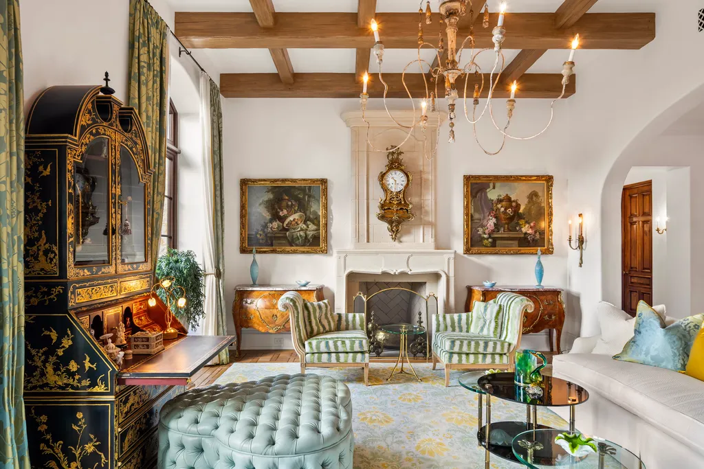 Inside Florida’s Most Ambitious Private Estate: The Oaks Emerges as a $115 Million Benchmark in Tampa Bay 9 Elegant living room at The Oaks Estate featuring fireplace, wood beam ceiling, and classic European decor in Tampa, Florida
