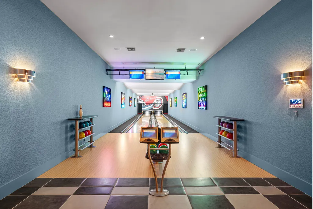 Inside Florida’s Most Ambitious Private Estate: The Oaks Emerges as a $115 Million Benchmark in Tampa Bay 11 Private bowling alley inside The Oaks Estate featuring two lanes and modern lighting in Tampa, Florida