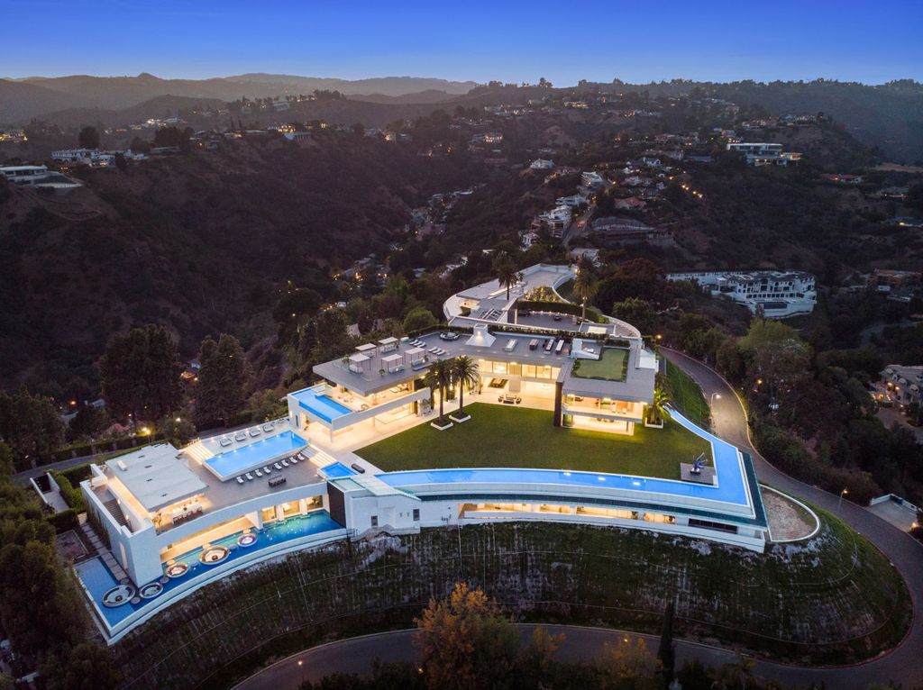Modern Mansions in California: Where Design, Power, and Global Wealth Converge 2 aerial view of The One Bel Air mega mansion in Los Angeles with infinity pools and hillside setting