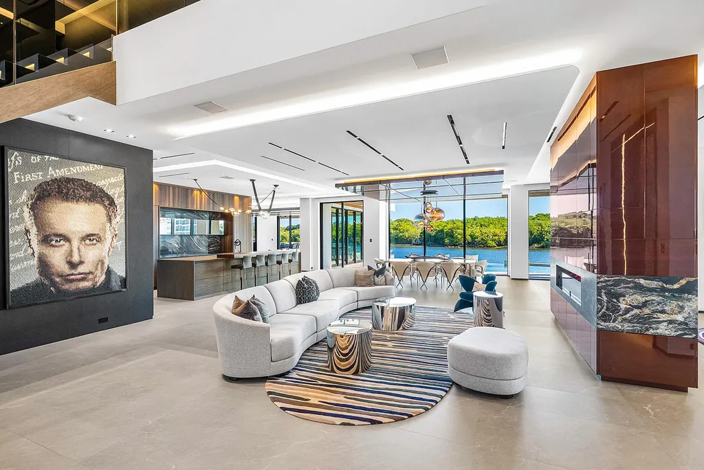 Boca Raton’s Trinity Point Estate Lists for $32.5 Million With 368 Feet of Intracoastal Frontage 4 Luxury great room at Trinity Point Estate in Boca Raton featuring floor-to-ceiling glass walls and panoramic Intracoastal views